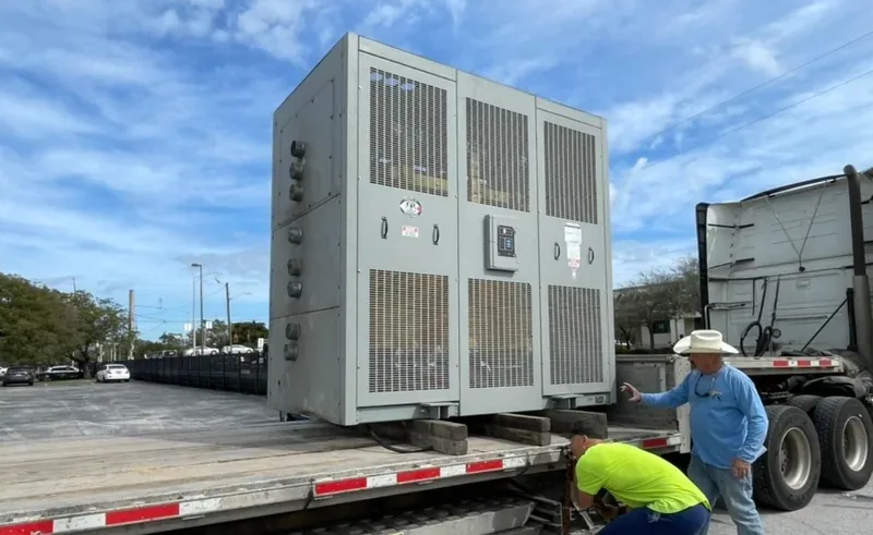 An electrical enclosure loaded on a trailer