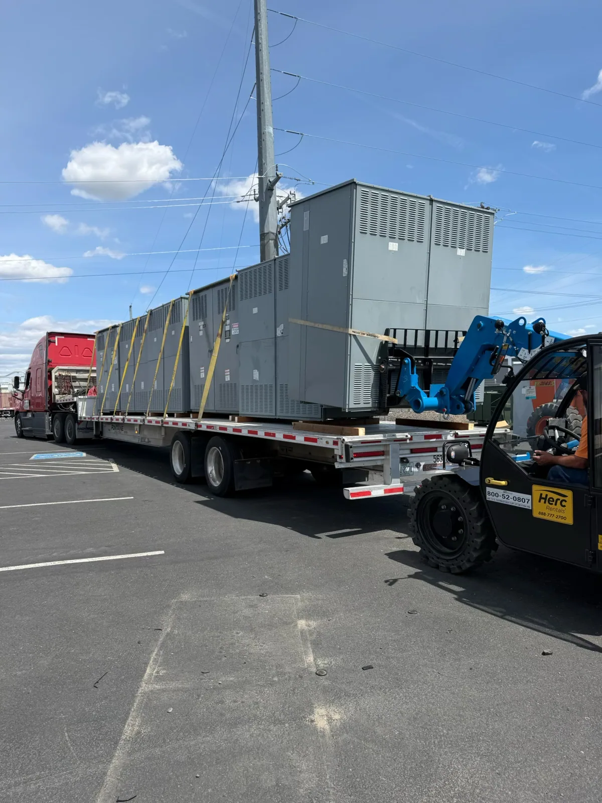 Switchgear sections loaded on a flatbed