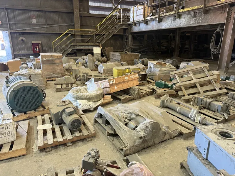 Crated equipment staged on a plant floor
