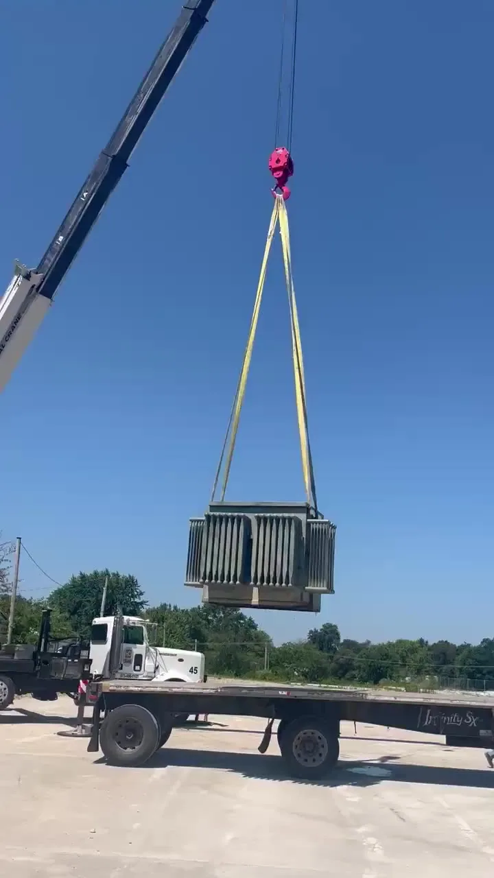 A crane lifting a transformer during removal