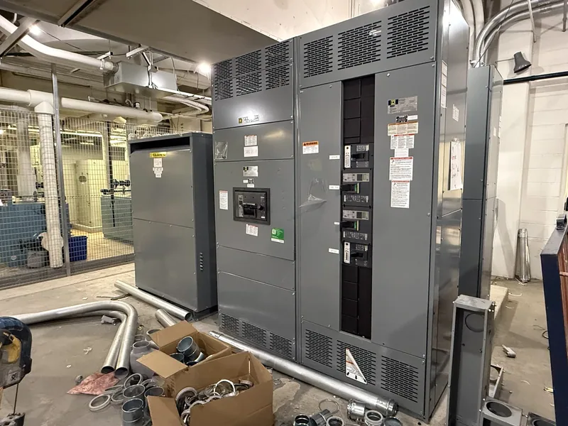A switchboard with conduit entering from above