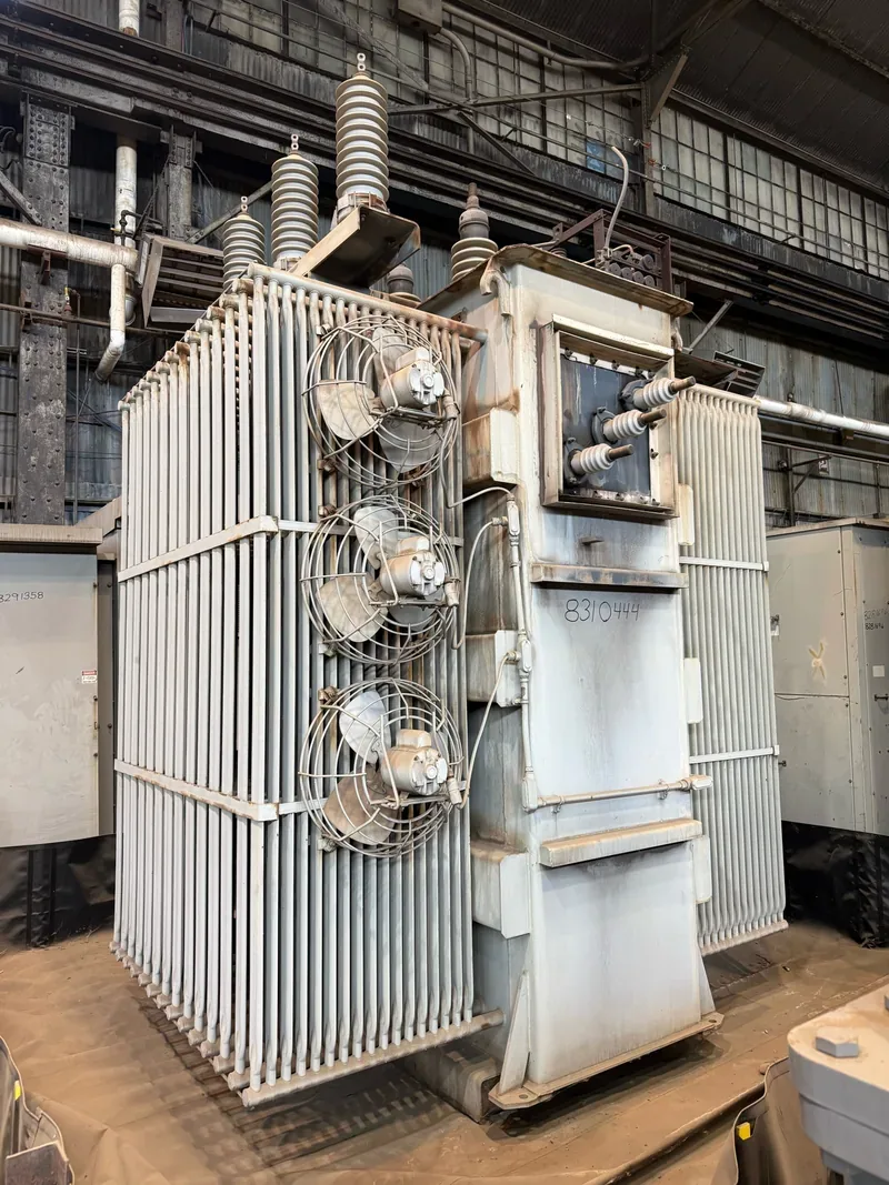 A substation transformer beside its secondary gear